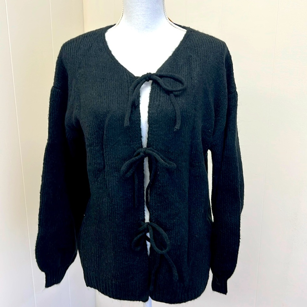 Ladies tie sweater. NWT